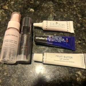 5 pack of setting sprays (2), primer, night balm, and a lip mask